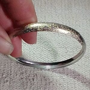 Silvertone textured bangle bracelet